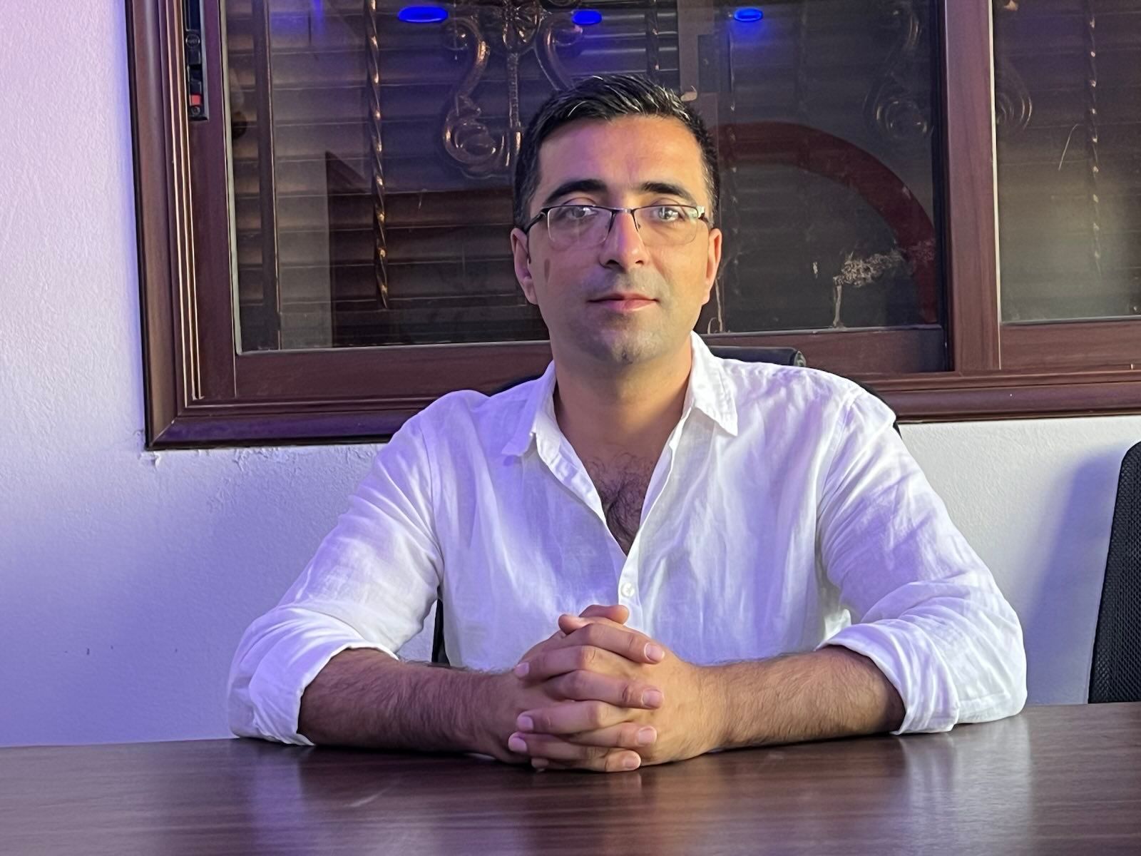 Mohammed Osman is sitting